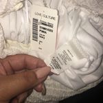 Love Culture  Ivory Flowy Shorts Photo 3