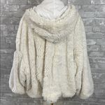 Free People Movement Take a Moment Faux Fur Hooded Jacket in ivory. Photo 5