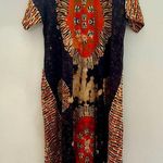 Deep Exports, featuring black background with orange and white circular patterns Size L Photo 0