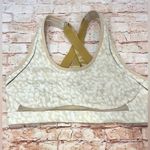 Fabletics  Cream and Gold Patterned Sports Bra Photo 1