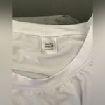 Bundle of three athletic tops 🖤🤍💙 NEW Blue Photo 6