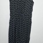 Molly Bracken  Black Dotted Jumpsuit Photo 1
