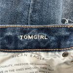 American Eagle  dark wash blue high rise distressed tomgirl button front jeans Photo 6