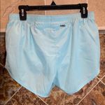 Nike Women’s  Light Blue Athletic Running Shorts Moisture-Wicking Medium Photo 1