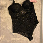 Jezebel 🆕  Black Lace One Piece Photo 3