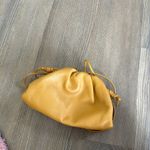 Bottega Veneta  Mini Pouch Clutch in yellow Photo 1