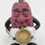 Raisin's California 1987 Vintage Raisin Saxophone Player Keychain Photo 0