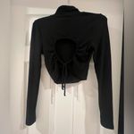 Final Touch  Black Ribbed Open Back Turtleneck Crop Top Photo 1