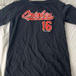 Genuine Merchandise T-Shirt Photo 0