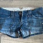 Decree  Blue Jean Shorts with Cut-Off Hem and Medium Wash Photo 0