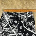 Tibi  Monochrome Floral Print Pants
Size: 2 Photo 7