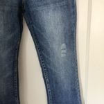 Women’s Medium Wash MidRise Slight Distress Babybell Jeans sz small Blue Photo 3