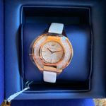 Swavorski Authentic SWAROVSKI Crystalline sporty gold stainless steel leather strap watch Photo 2
