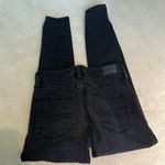 American Eagle  Next Level Highest Waist Jeggings in Black. Photo 6