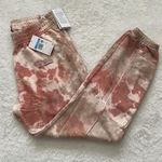 Nike (NWT) Loose Fit Tie Dye Cuffed Sweatpants in Dusty Orange, Medium Photo 0