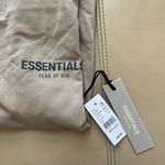 Fear of god ESSENTIALS Tan Short-Sleeve Polo Shirt Photo 9