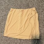 And Now This Stylish Tan Skirt Photo 0