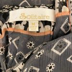 Solitaire Sheer Ruffle Top Photo 3