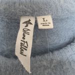 Others Follow Tilly’s Light Blue Fuzzy Sweater Photo 3