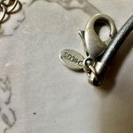 Chico's Chico’s silver tone disc on cord choker necklace Photo 7