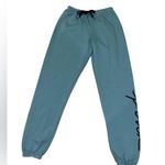 PINK - Victoria's Secret Victoria’s Secret PINK sage green joggers with black logo Photo 0