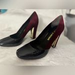 Pour La Victoire Pour lanVictoire These suede shoes shine with metal detailing on each heel Photo 2