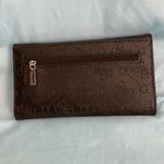 Guess by Marciano Wallet. Soft and Black in Color. 7” Long x 4” Wide. Photo 1