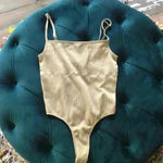 Forever 21 tan bodysuit size small. In great condition! Photo 0
