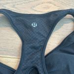 Lululemon COPY - black  sports bra in good condition except for the logo fading Photo 2