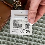 Lululemon NWT  Dual Pouch Wristlet
Cactus Leather
Chestnut Brown/Gold Photo 3