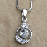 Silver Tone Round Crystal Halo Pendant Necklace Photo 0