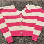 Jessica Simpson , pink and off-white striped cropped cardigan.￼ Photo 0