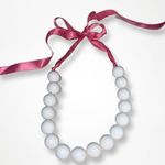 Strung Milk Glass Beads on Pink Silk Ribbon Photo 0