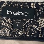 Bebe  Black and White High-Low Lace Skirt. Size L Photo 1