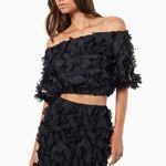Elliatt Marsha 3D Flower Off Shoulder Crop Top and Mini Skirt Set Black Photo 1