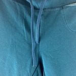 Nike teal Dry-Fit athletic capris sweat pants size small Photo 3