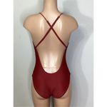 Becca New. knotted one piece. Size medium. Retails $129 Photo 5