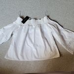 Romeo + Juliet Couture White Smocked Off-Shoulder Blouse Size S Photo 1