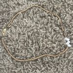 Gold And White Necklace Photo 0