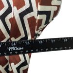 Geometric Print‎ Wide Leg Jumpsuit with Belt and Pearl Detail Photo 7