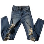 American Eagle Next Level Stretch distressed women's size 0 short blue j… Photo 0