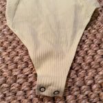 Abercrombie & Fitch yellow ribbed snap button bodysuit women’s size small Photo 2
