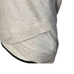 Athleta X-Small Criss Cross Sweatshirt Tulip Hem Stretch Semi-Fitted Long Sleeve Photo 2