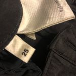 Reformation ❤️  black skinny jeans with knee rips Photo 1