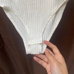 NWOT cream faux button body suit size small White Photo 3