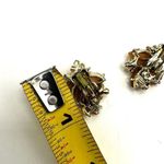 Gold tone orange leaf floral clip on earrings Photo 7