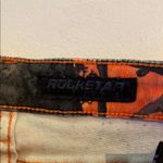 Rockstar Vibrant Orange and Black Jeans with Distressed Details Size XS Photo 2