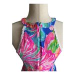 Lilly Pulitzer Gorgeous bright color floral dress, white crochet circles bodice, dress is fully lined, has pockets, hidden back zipper, excellent condition Measurements: Bust: armpit to armpit 16 inches Waist: side to side 14 inches Length: shoulder seam to bottom Photo 3