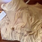 Lululemon  lightweight high neck open back romper in prosecco nwt size 8 Photo 1