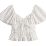 SO  Eyelet Flutter Smocked Top Photo 0